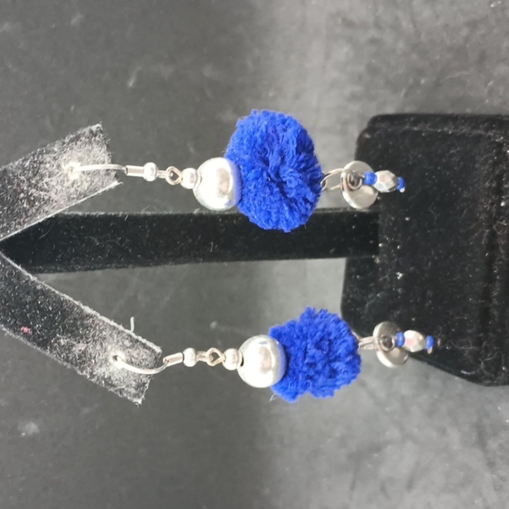 Fluffy blue pom pom dangle earrings